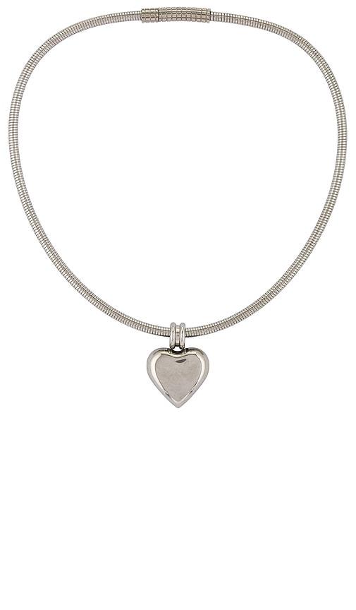 petit moments irresistible necklace in metallic silver.