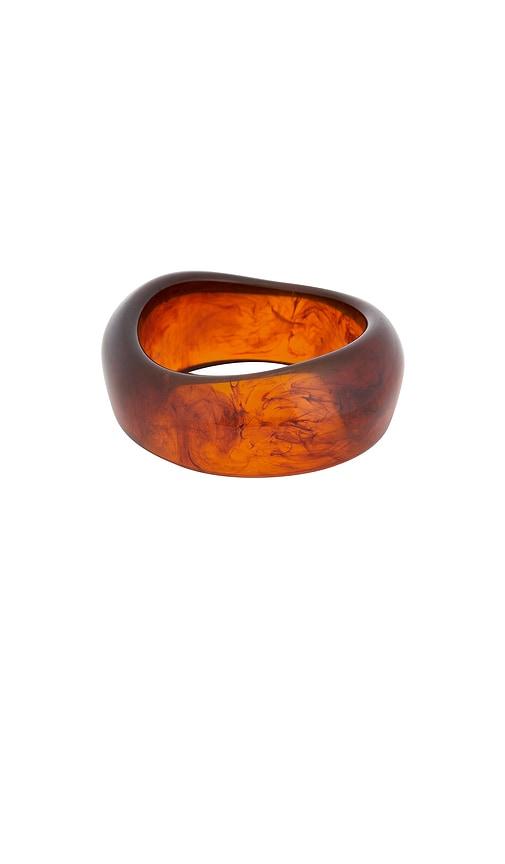 petit moments resin cuff in brown.
