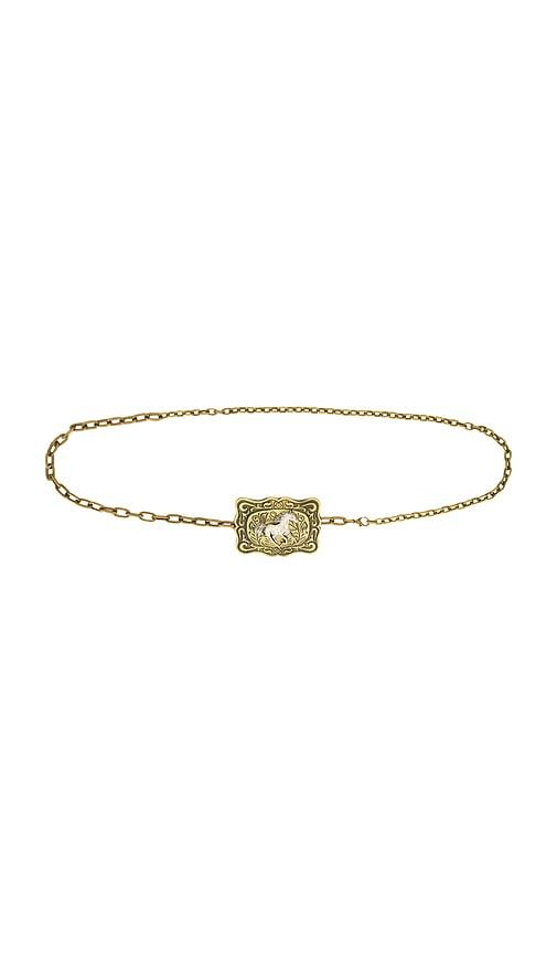 petit moments rodeo chain belt in metallic gold.