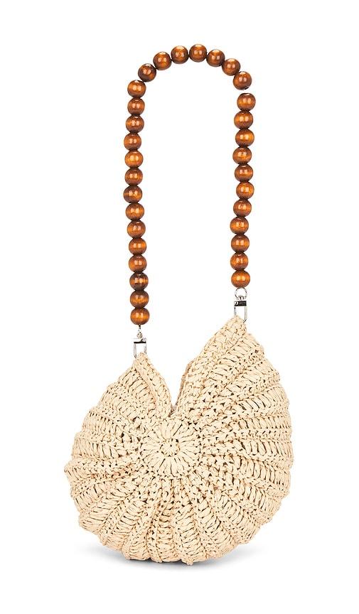 petit moments sirena shell bag in beige.