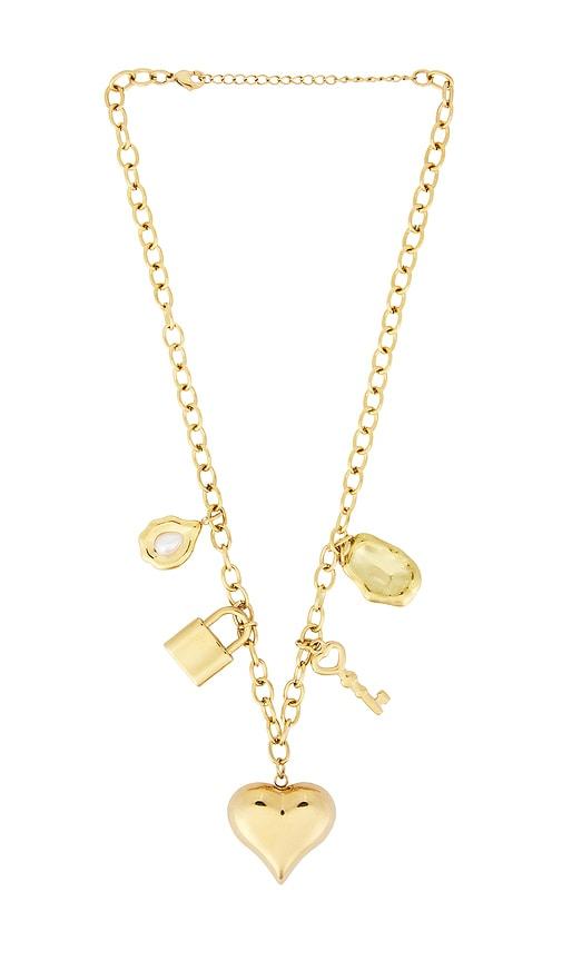 petit moments vera charm necklace in metallic gold.
