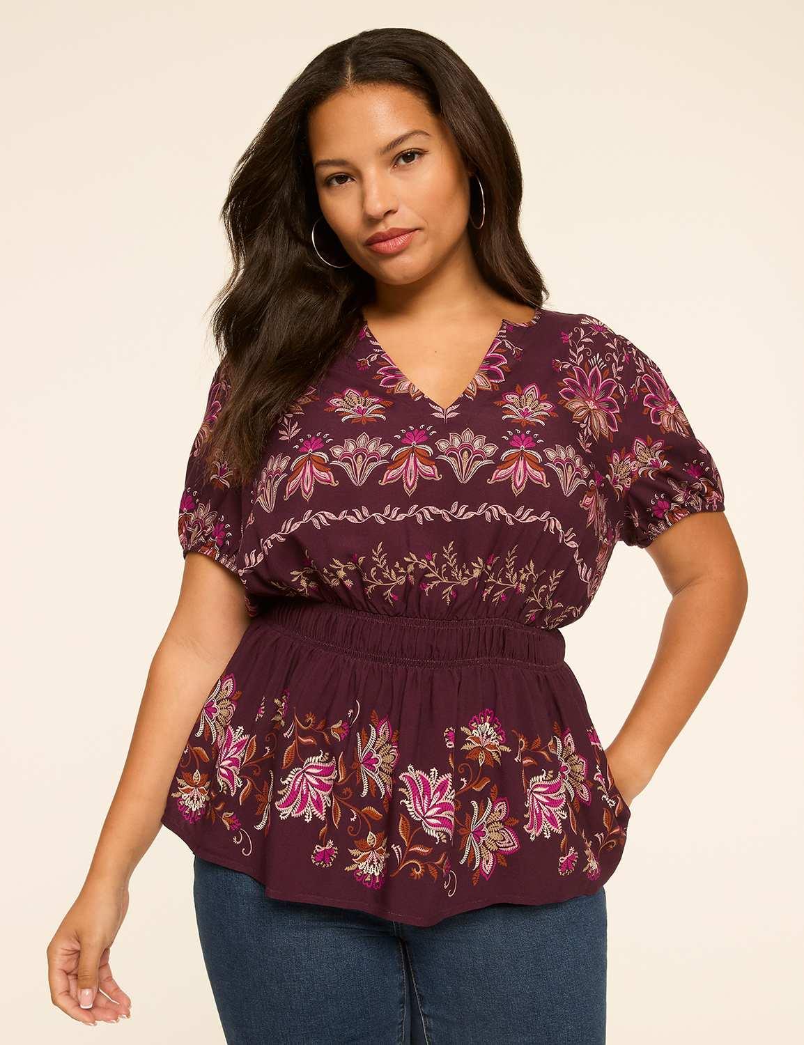puff-sleeve split-neck peplum top
