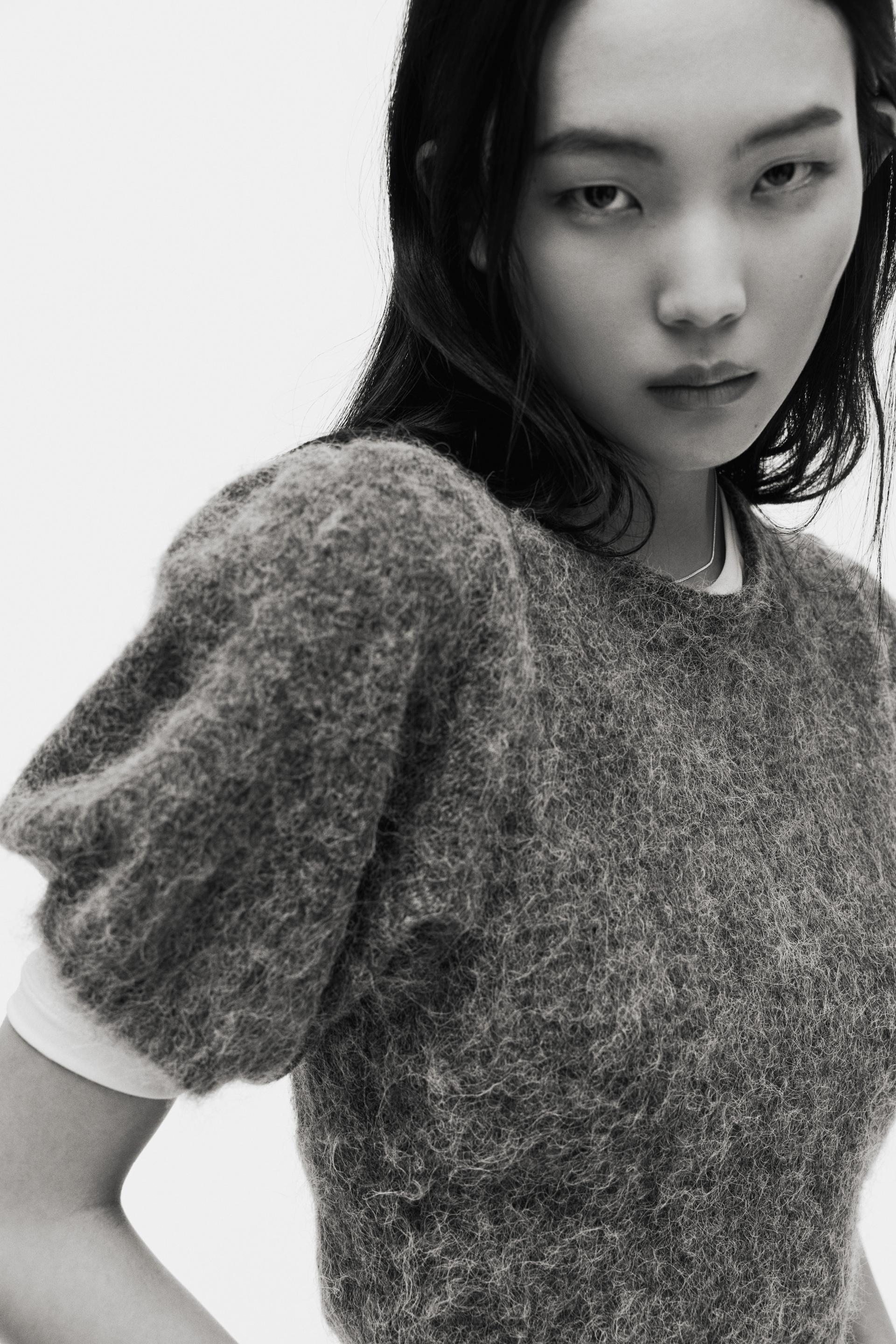 puff-sleeved knit top