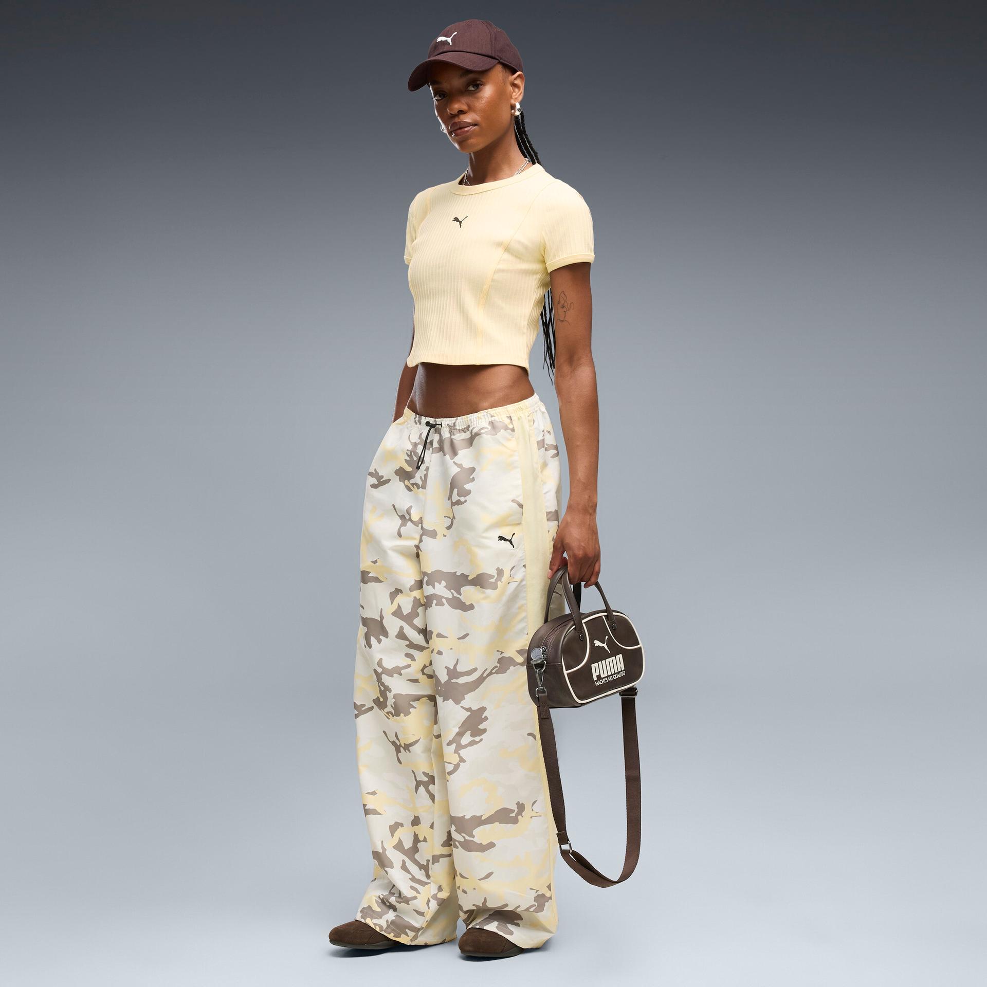 puma street glam women's relaxed camo pants in yellow, size l