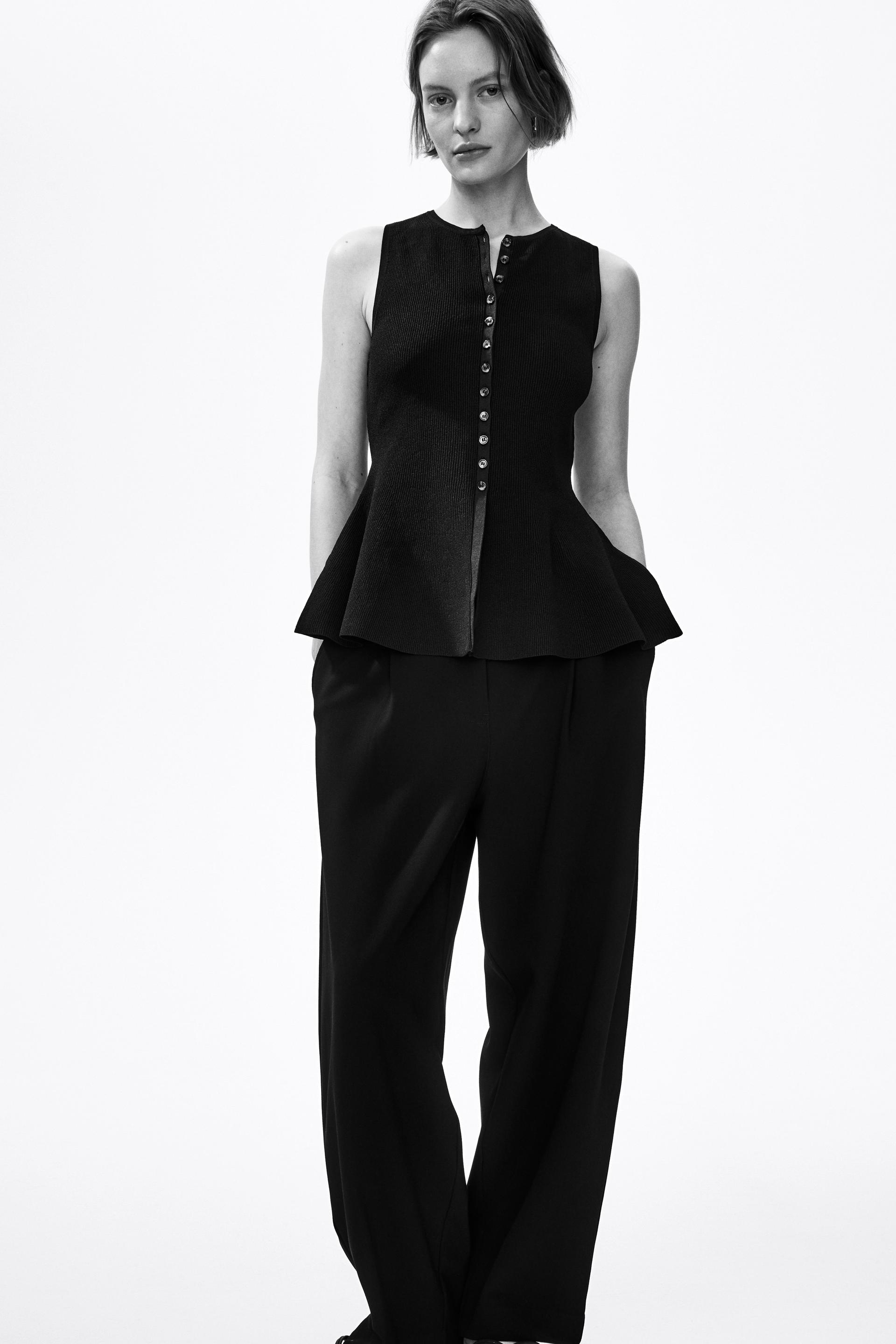 rib-knit peplum sleeveless top