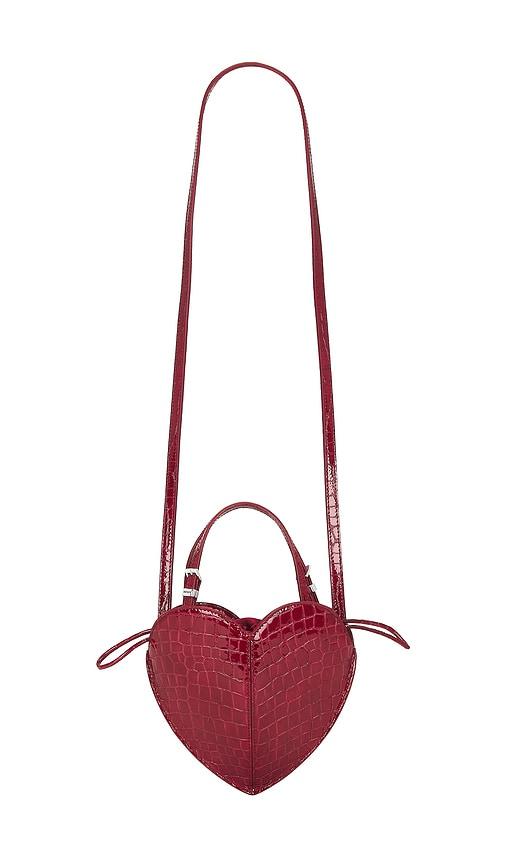 rotate patent croco heart bag in wine.