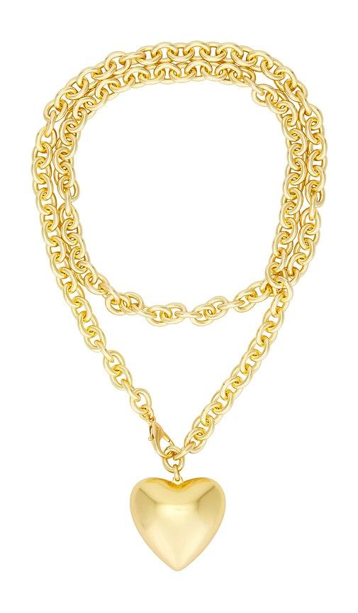roxanne assoulin heart and soul long pendant necklace in metallic gold.