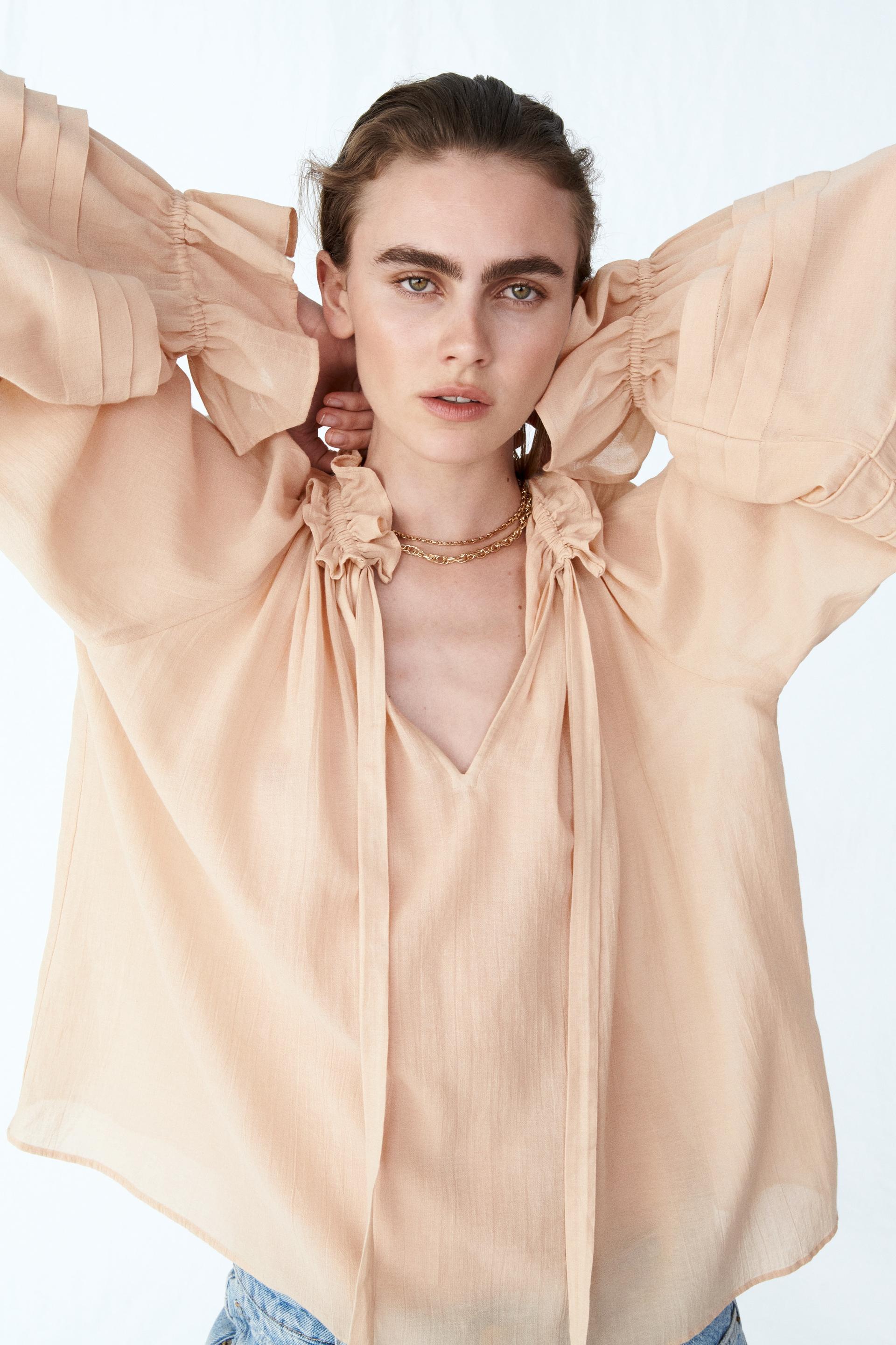 ruffle-collar blouse