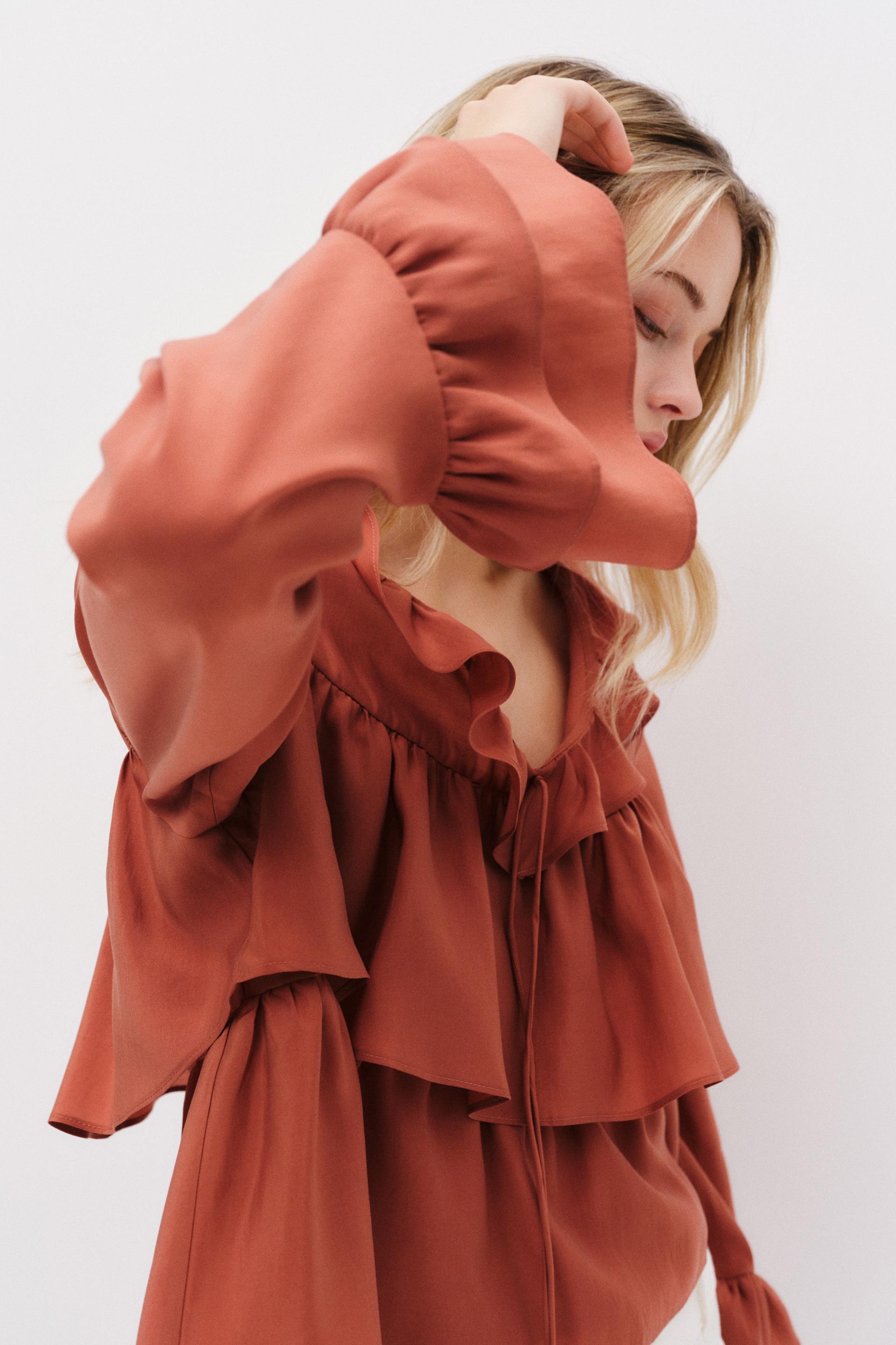 ruffle-trimmed blouse