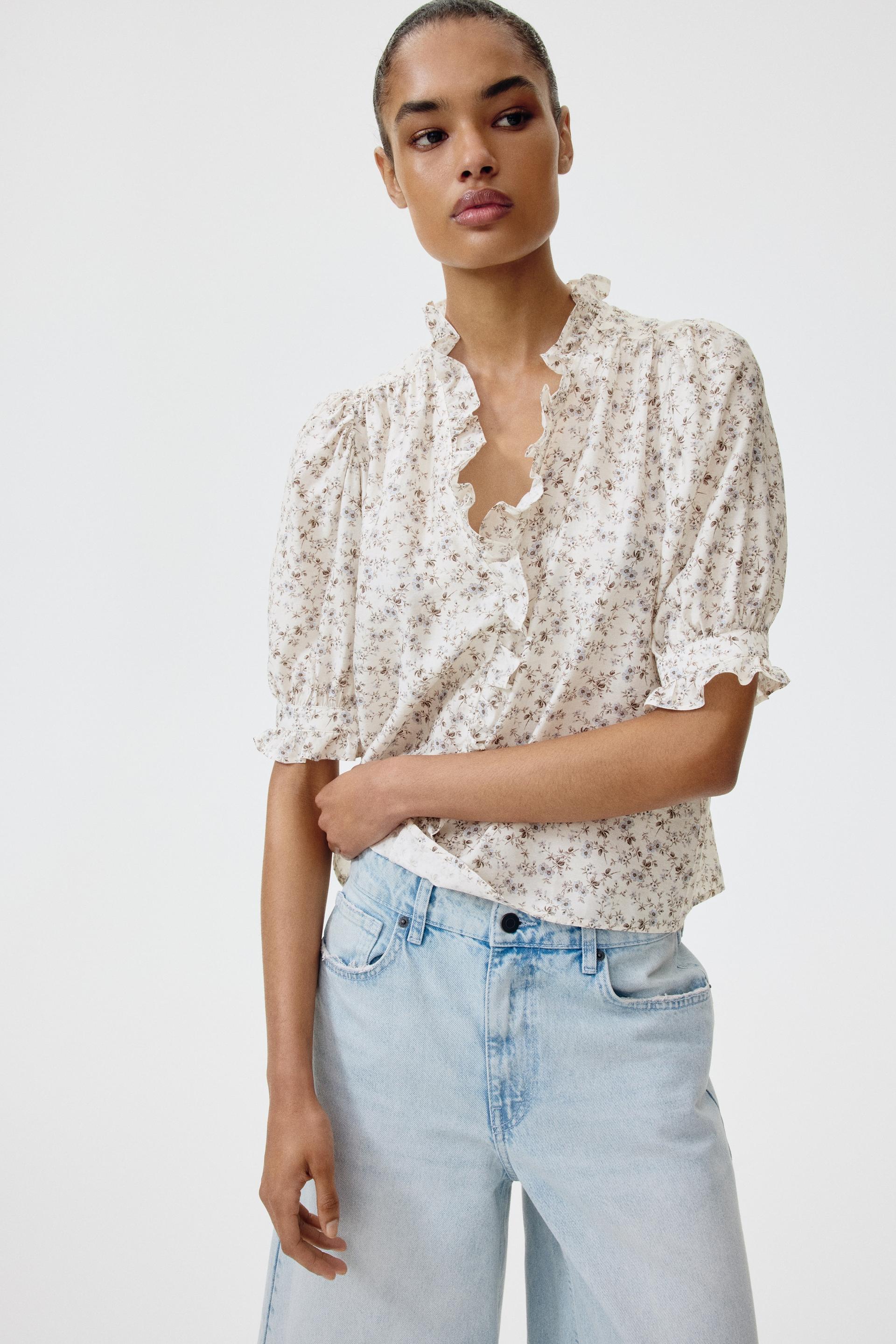 ruffled puff-sleeved blouse