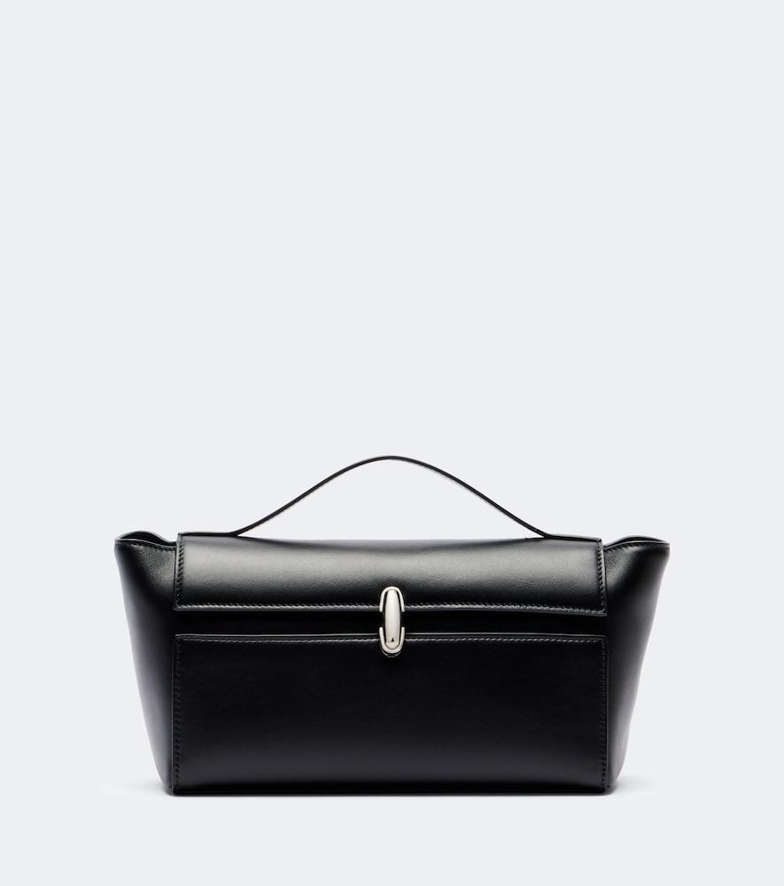 savette symmetry trapeze leather clutch