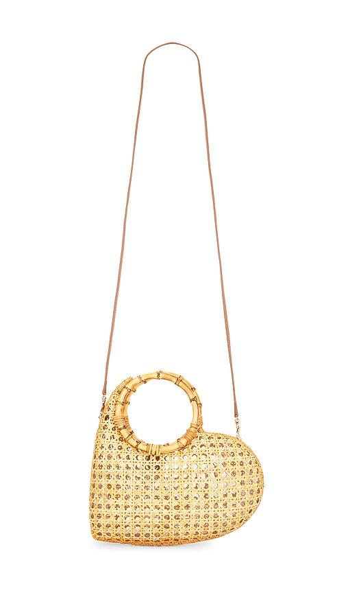 serpui marie heart top handle bag in neutral.