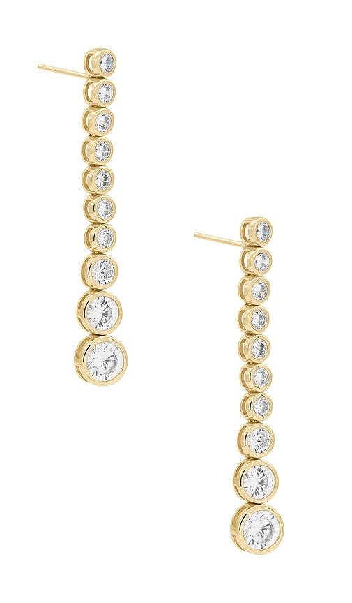 shashi bezel diamond drop earring in metallic gold.