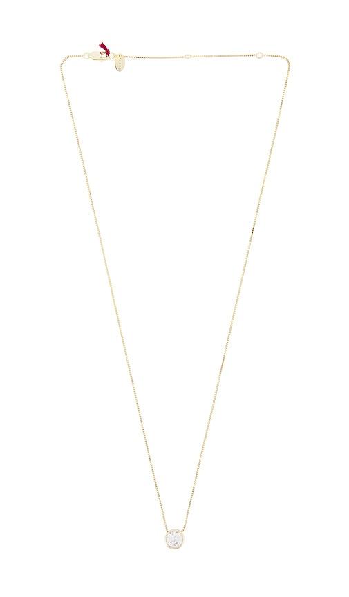 shashi bezel necklace in metallic gold.