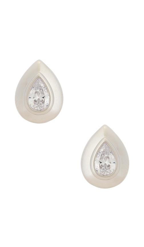 shashi carson stud earrings in metallic silver.