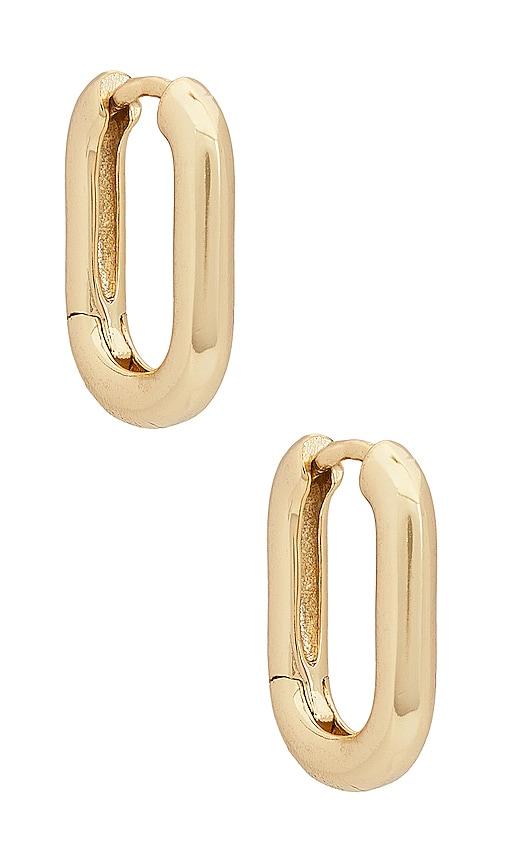 shashi cosmo huggie in metallic gold.