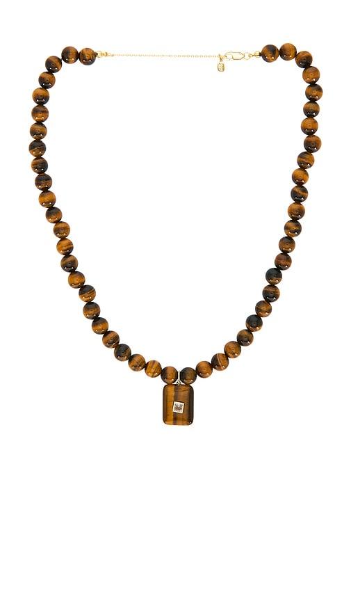 shashi gemstone tiger eye pendant necklace in brown.