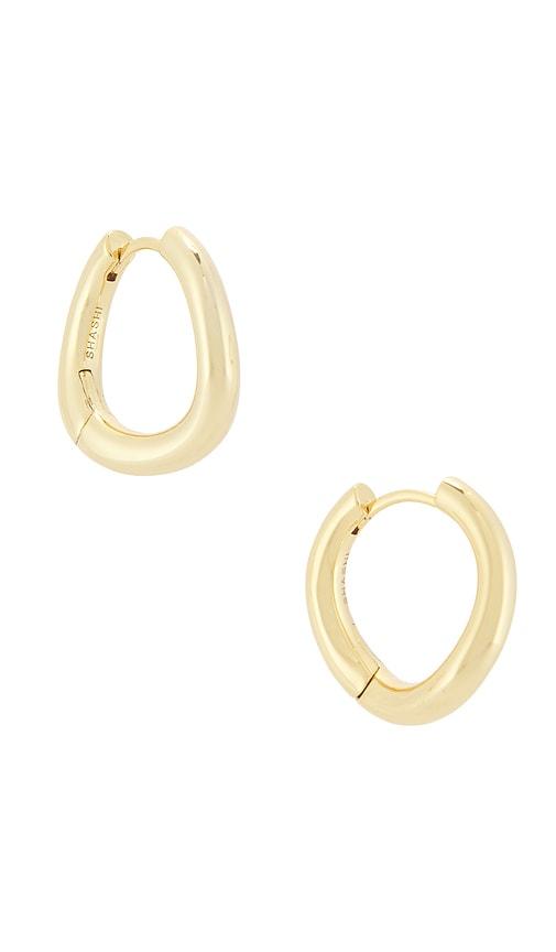 shashi lennox hoop earrings in metallic gold.