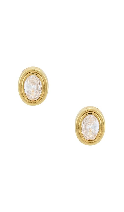 shashi reagan stud earrings in metallic gold.
