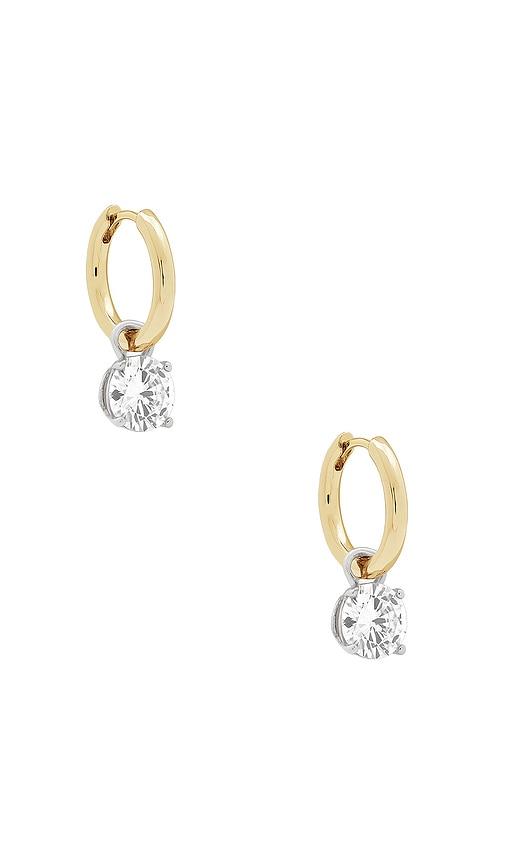 shashi roux huggie earring in metallic gold.