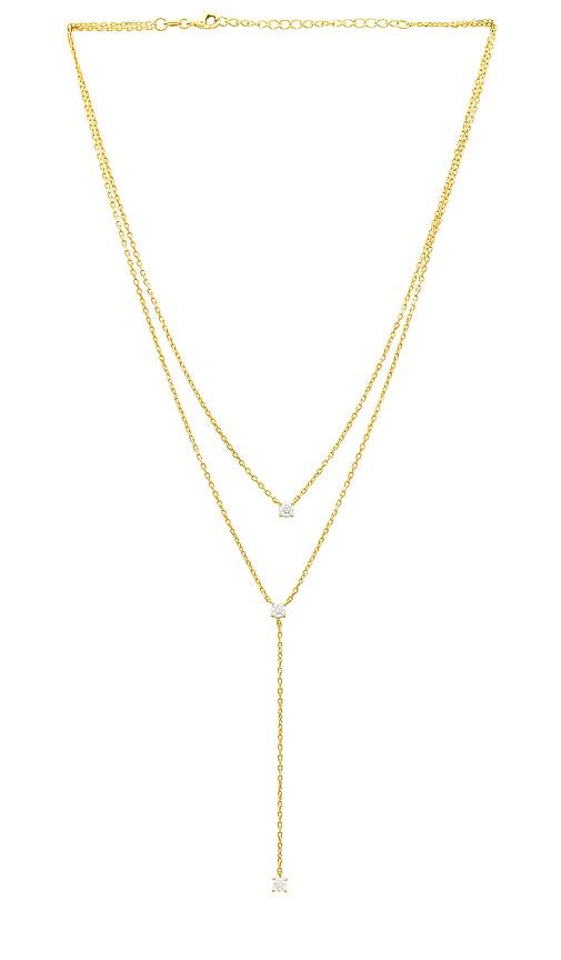 shashi solitaire layered lariat in metallic gold.