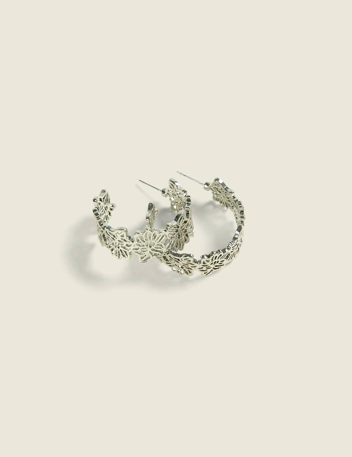 silvertone lotus flower hoop earrings