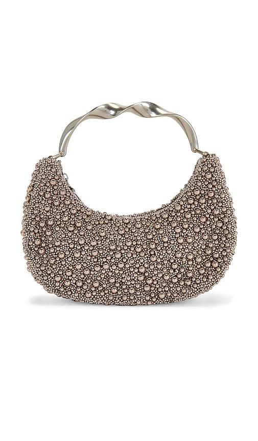simkhai evelyn twist top handle bag in metallic silver.