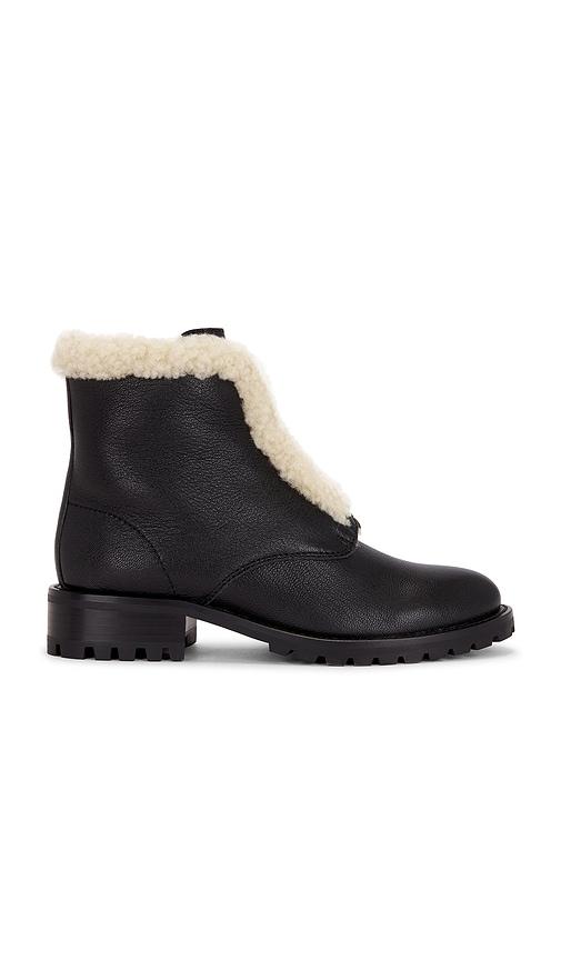 simkhai noah shearling lug zip boot in black. - size 39 (also in 40)
