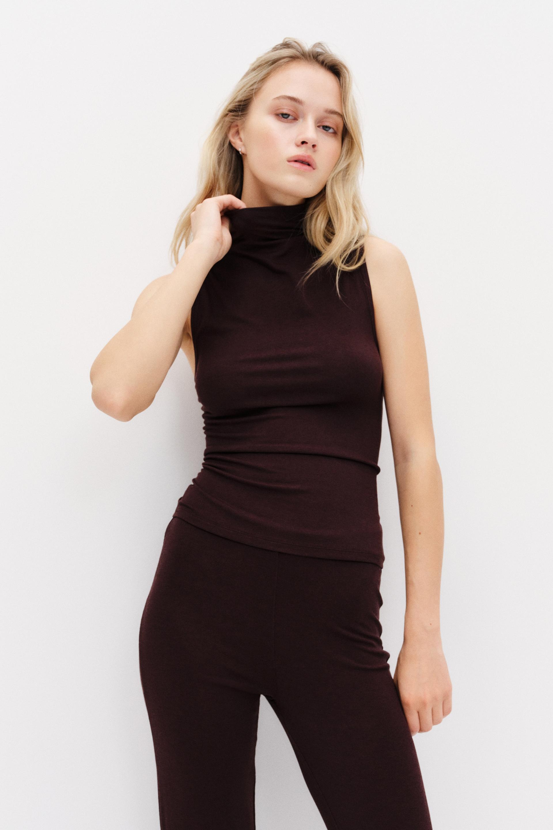 sleeveless mock turtleneck top