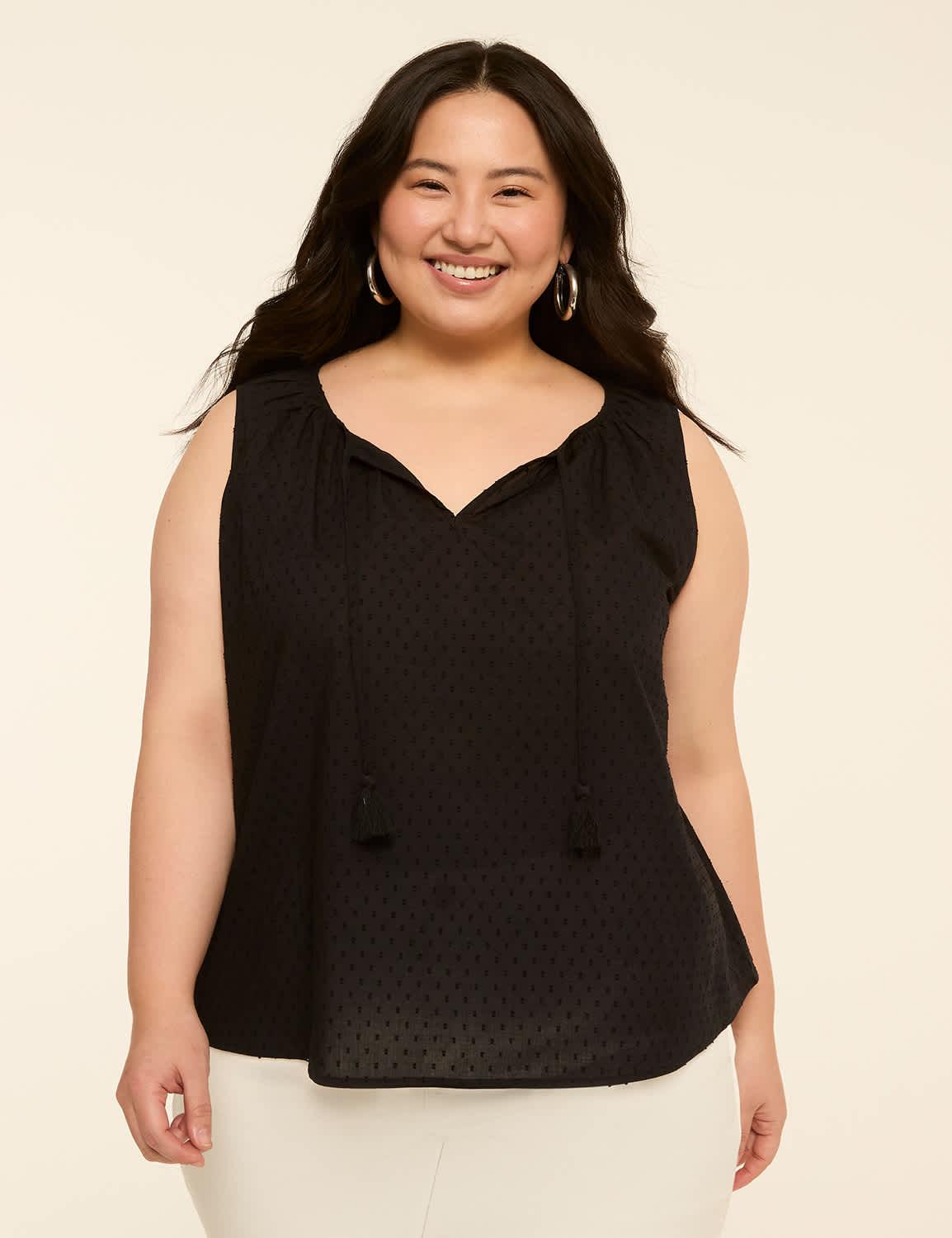 sleeveless tie-neck blouse
