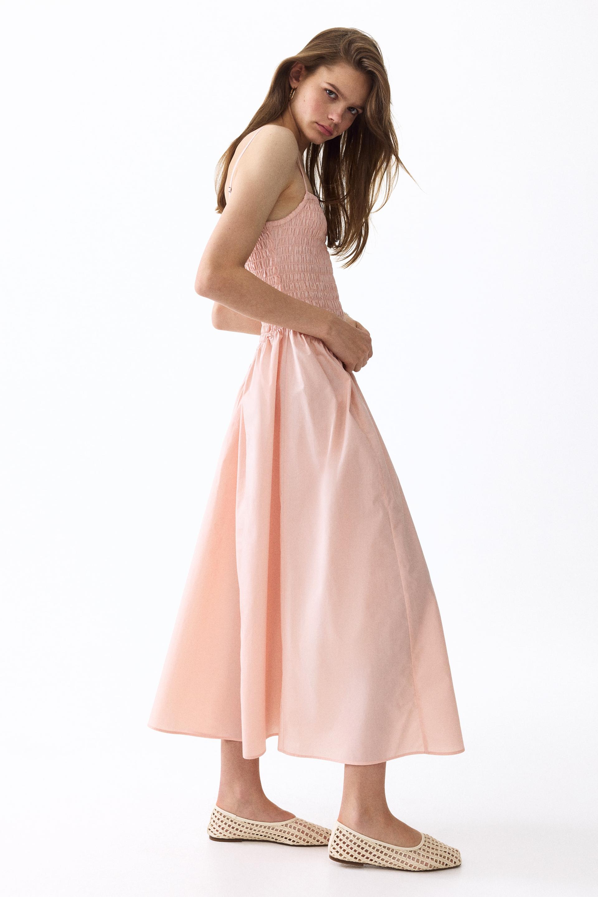 smocked dress with flared skirt