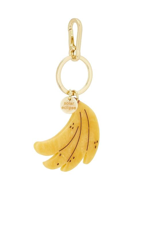 solar eclipse hand-painted banana bag charm + keychain in yellow.
