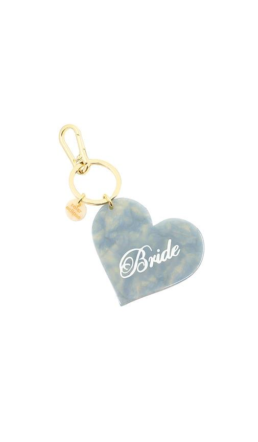 solar eclipse hand-painted bride bag charm & keychain in blue.