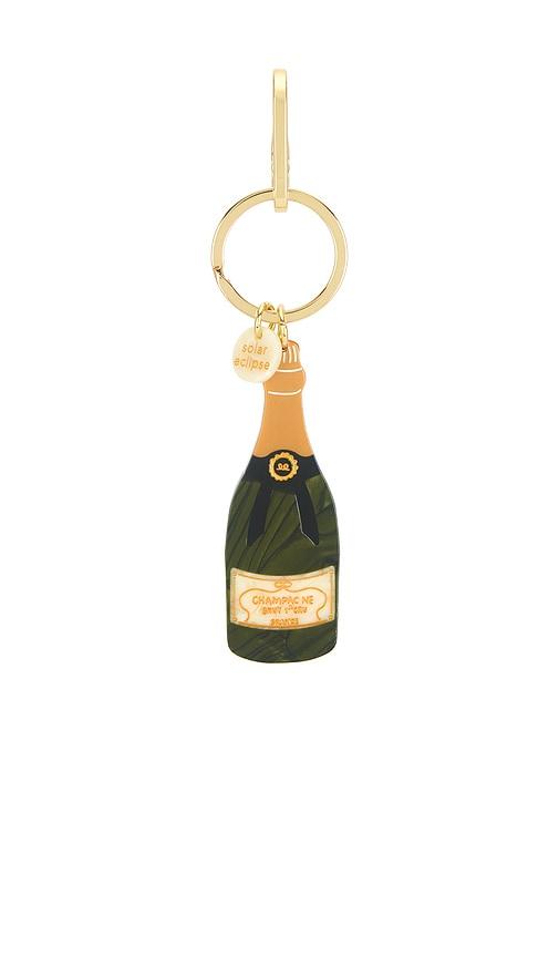 solar eclipse hand-painted champagne bag charm + keychain in green.
