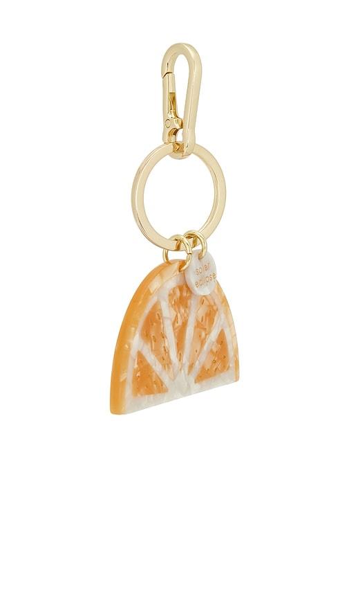 solar eclipse hand-painted citrus slice bag charm + keychain in orange.