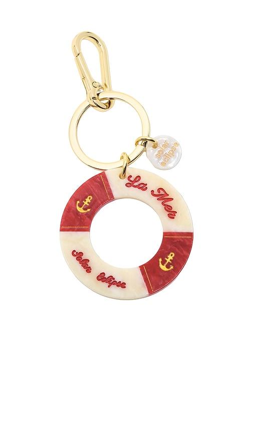 solar eclipse hand-painted lifesaver bag charm & keychain in red.