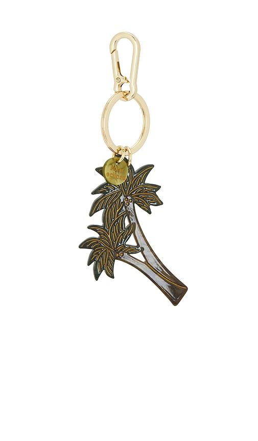 solar eclipse hand-painted palm trees bag charm + keychain in green.