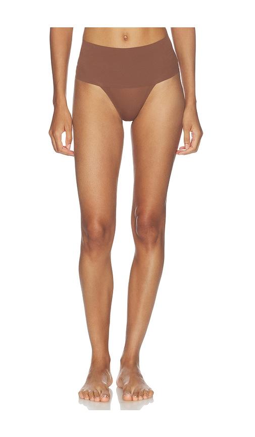 spanx supersmooth undie-tectable thong in brown. - size l (also in xs, s, m, xl)