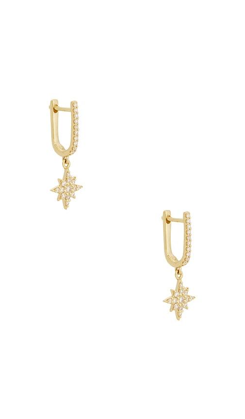 stone and strand northern star pave huggie earrings in metallic gold.