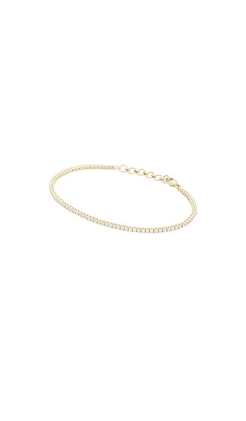 stone and strand the essential dainty tennis bracelet in metallic gold.