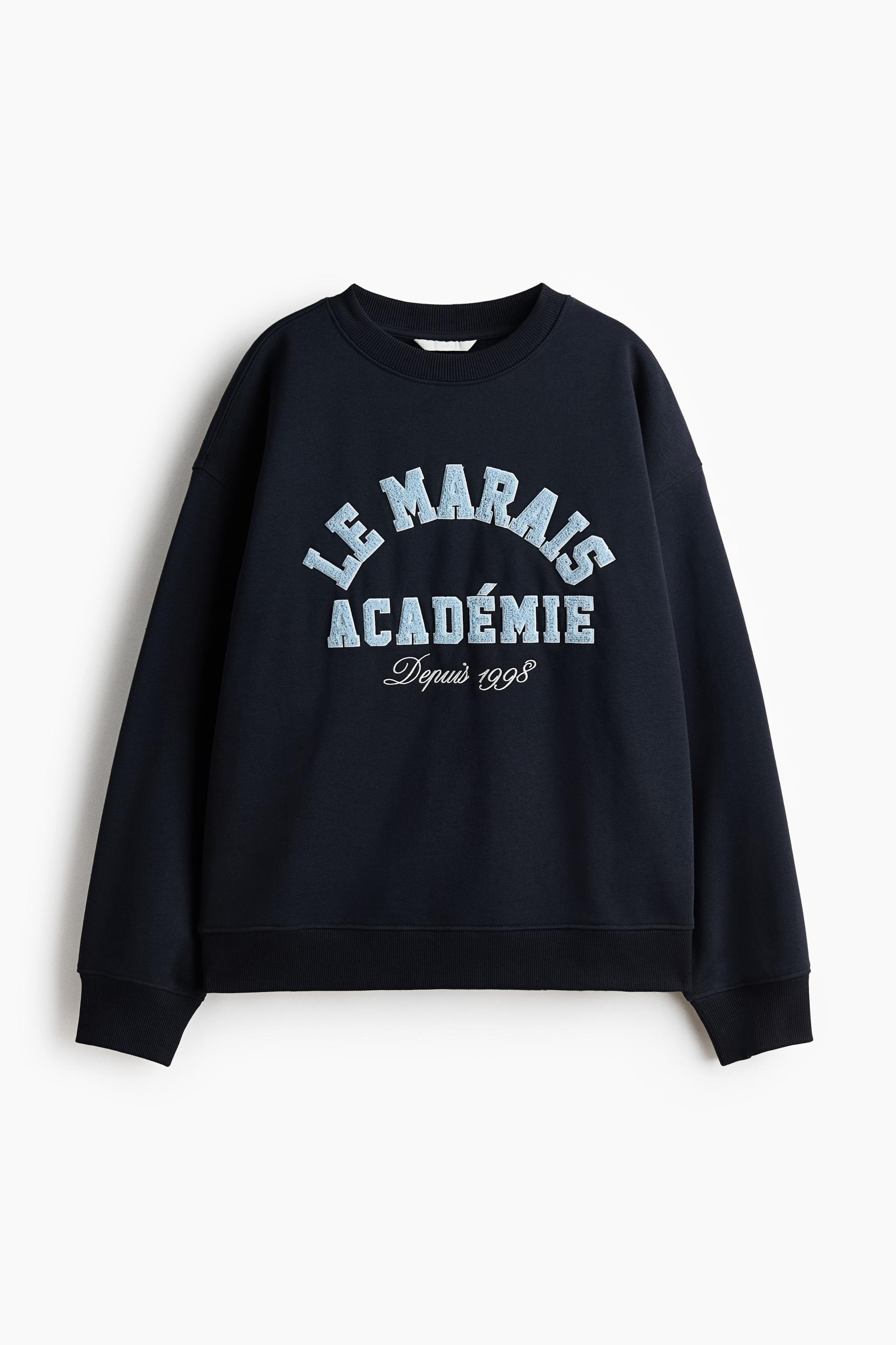 sweatshirt with text motif