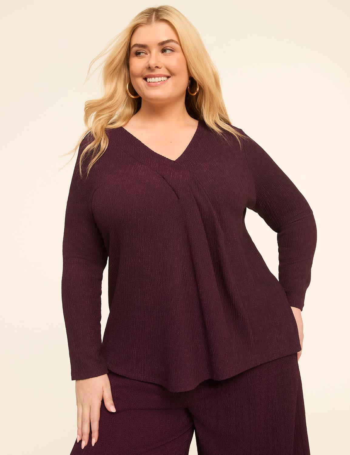 swing textured long-sleeve pleat-front top