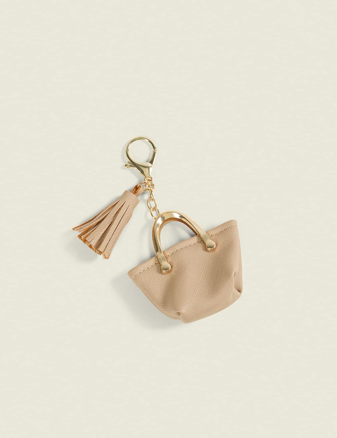 tan purse bag charm