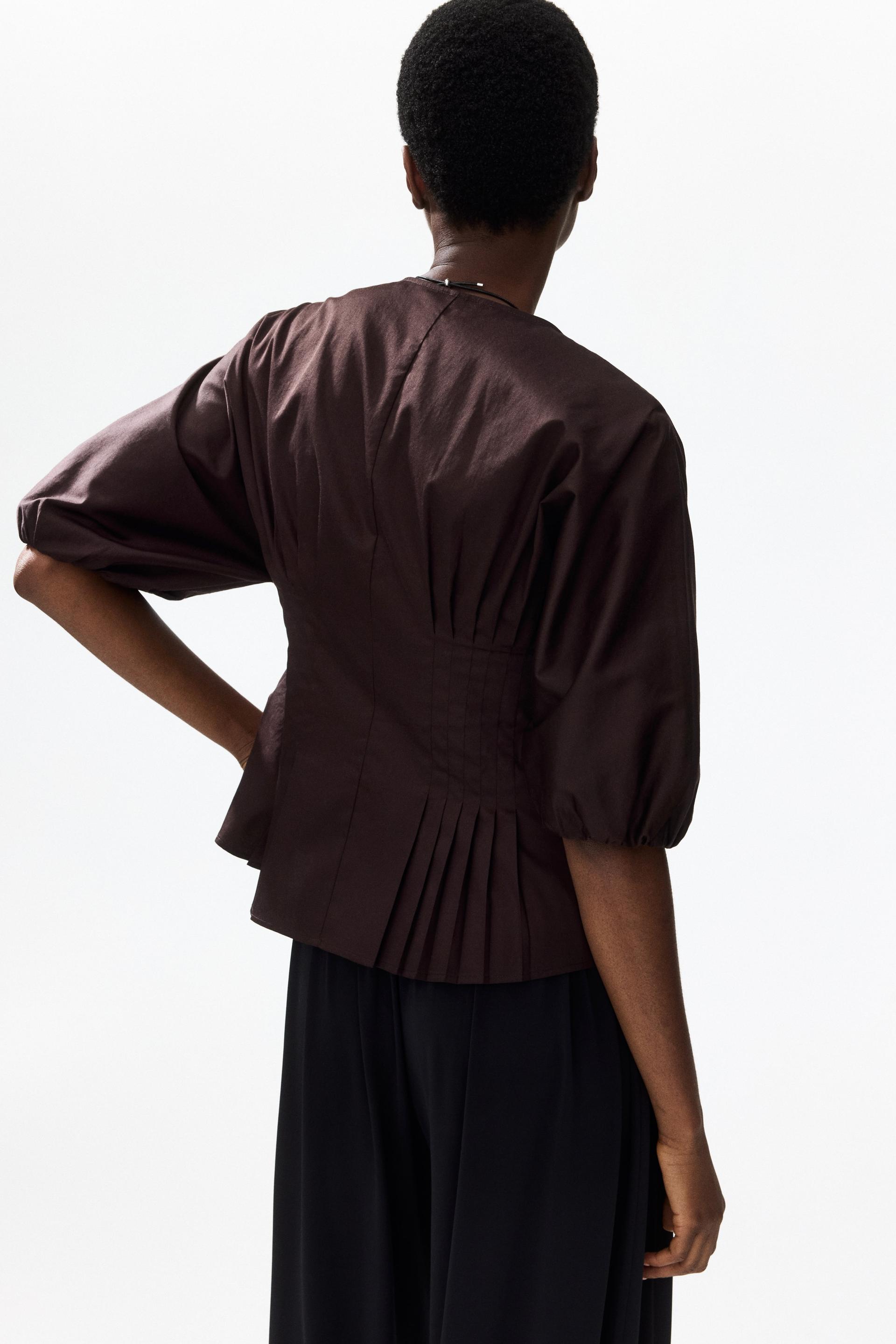 tapered-waist cotton blouse