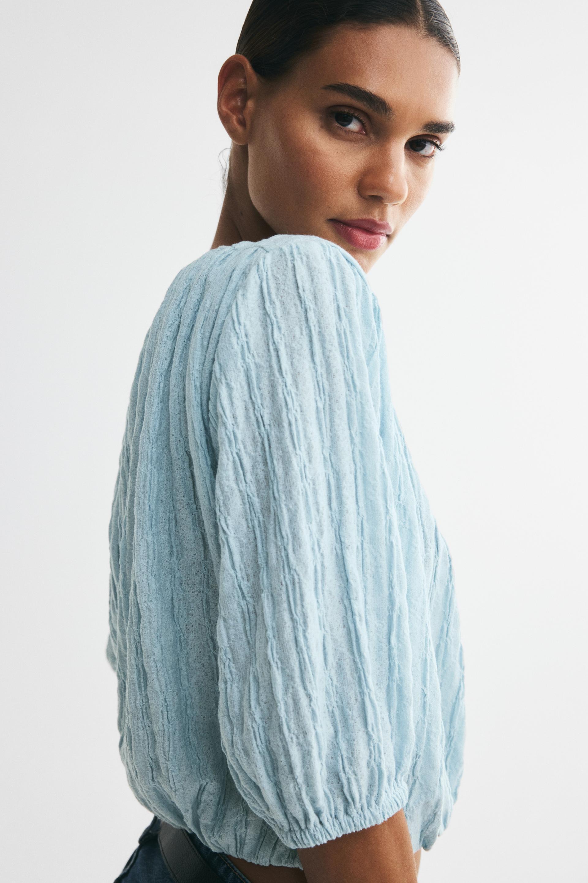 textured bubble-hem blouse