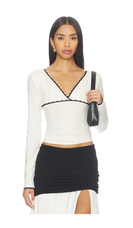 the line by k axel top in cream. - size m (also in xs, s)
