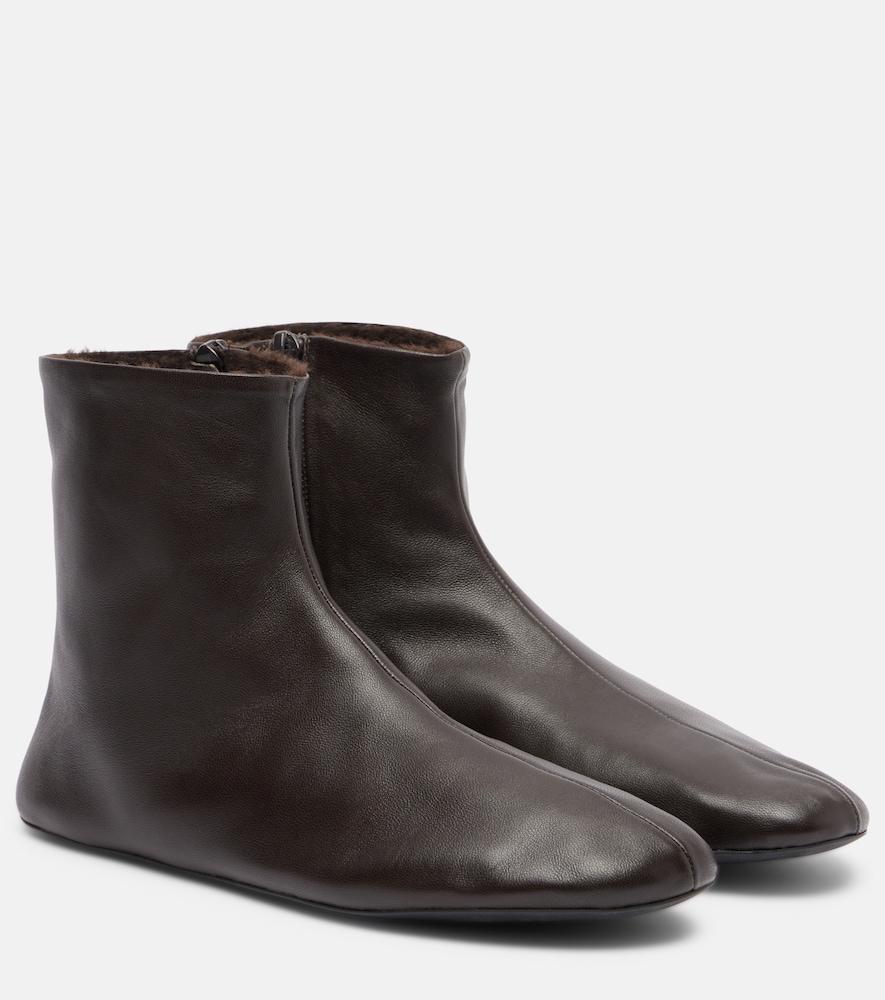the row stella shearling-lined leather ankle boots
