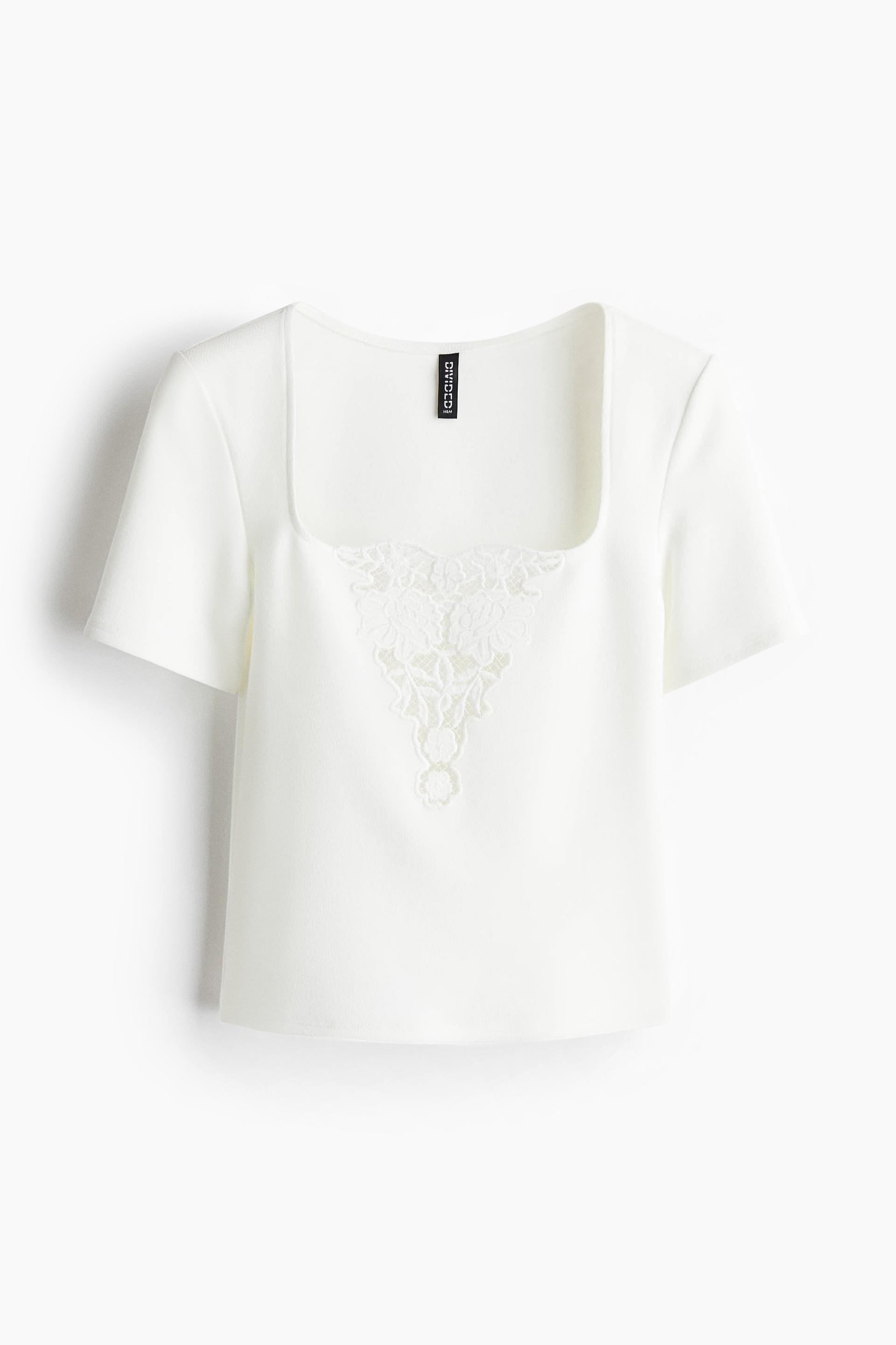 top with eyelet embroidered detail