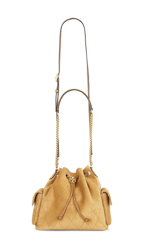 tory burch charlie quilted suede drawstring shoulder bag in tan.