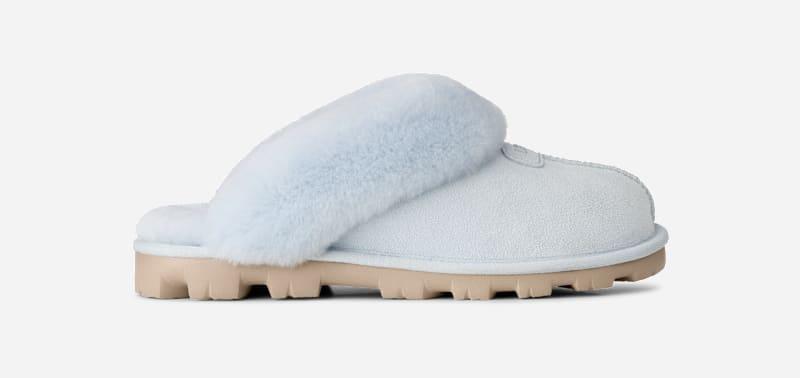 ugg® women's coquette durable sheepskin slipper in sky blue, size 9